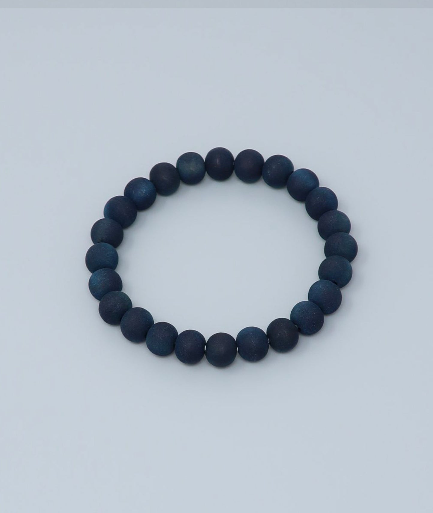 Women's indigo pearl bracelet made from mountain cherry wood, handcrafted in Japan using traditional Sho-Aizome indigo dyeing by Kanbe Juzu of Kyoto; spiritual accessory inspired by samurai, ideal for yoga, prayer, or as a premium gift.