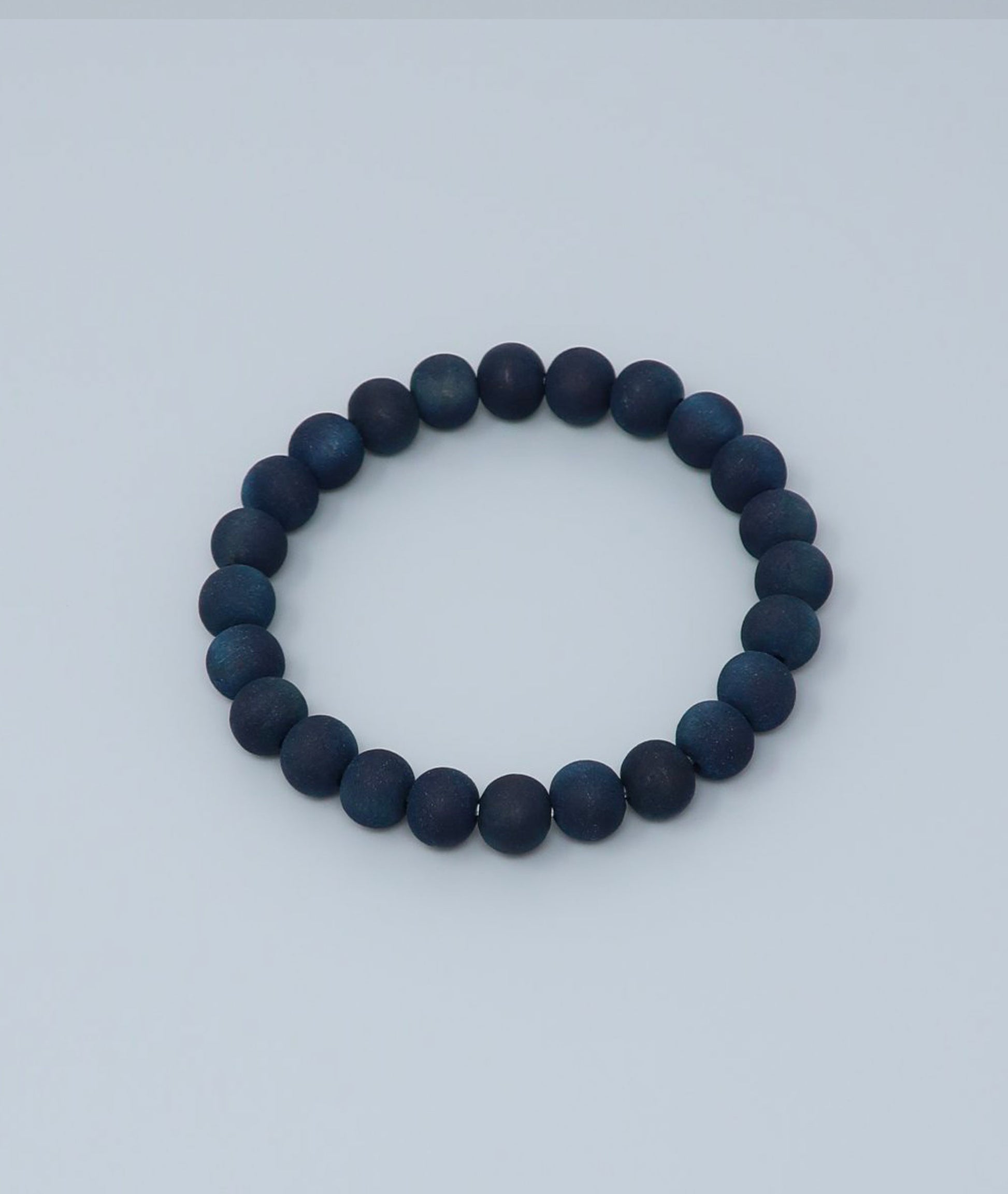 Women's indigo pearl bracelet made from mountain cherry wood, handcrafted in Japan using traditional Sho-Aizome indigo dyeing by Kanbe Juzu of Kyoto; spiritual accessory inspired by samurai, ideal for yoga, prayer, or as a premium gift.