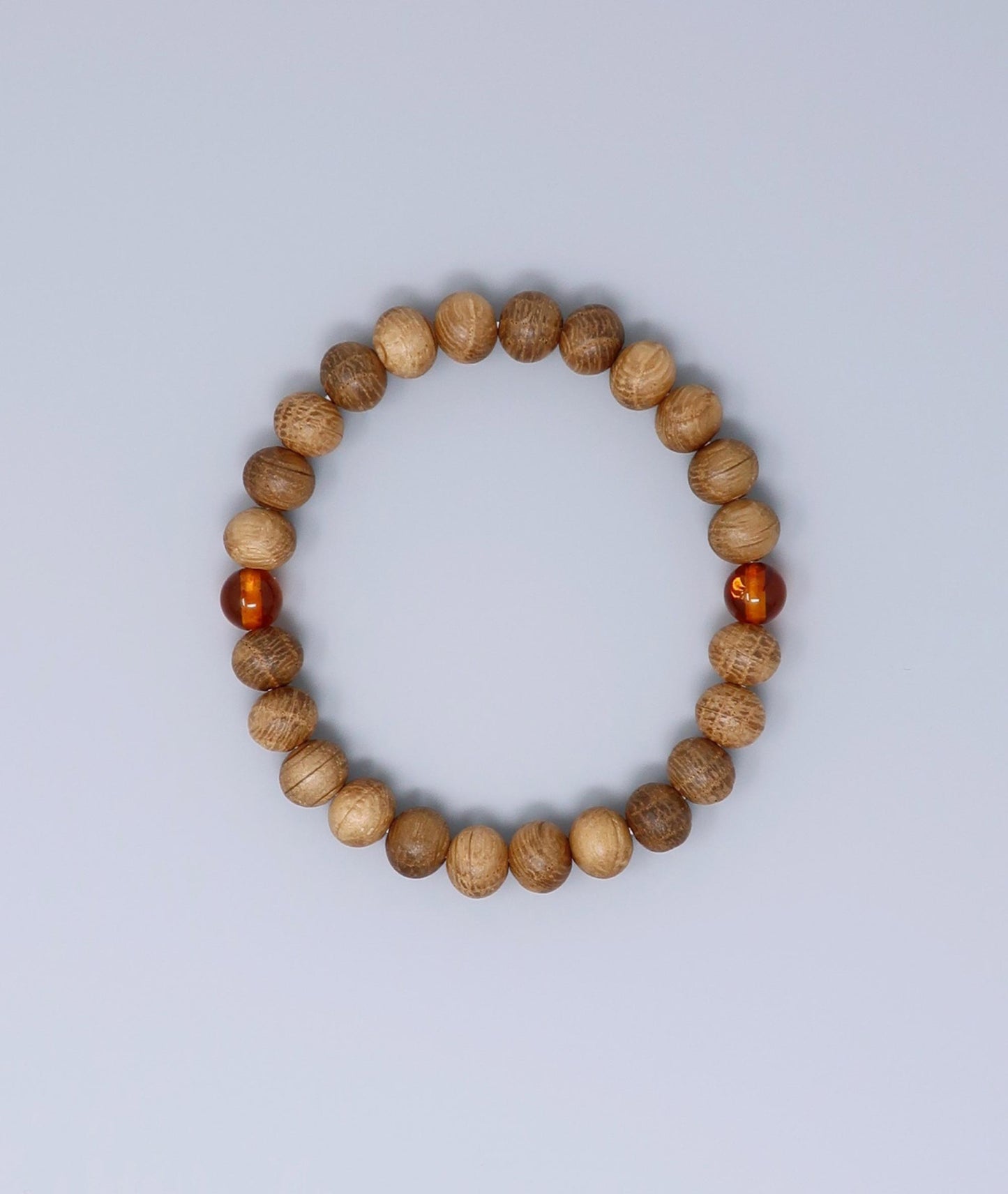 All gender Whiskey Barrel Wood Amber Bracelet made from reclaimed whiskey barrel wood with compressed amber accents, handcrafted in Japan Kanbe Juzu, ideal for amulet, yoga, meditation, prayer, or gifting.