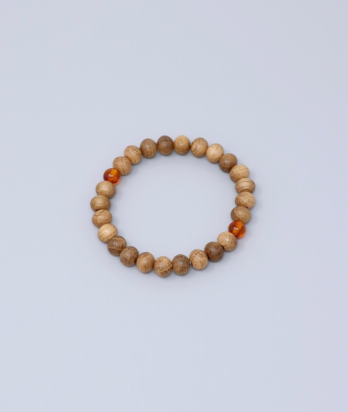 All gender Whiskey Barrel Wood Amber Bracelet made from reclaimed whiskey barrel wood with compressed amber accents, handcrafted in Japan Kanbe Juzu, ideal for amulet, yoga, meditation, prayer, or gifting.